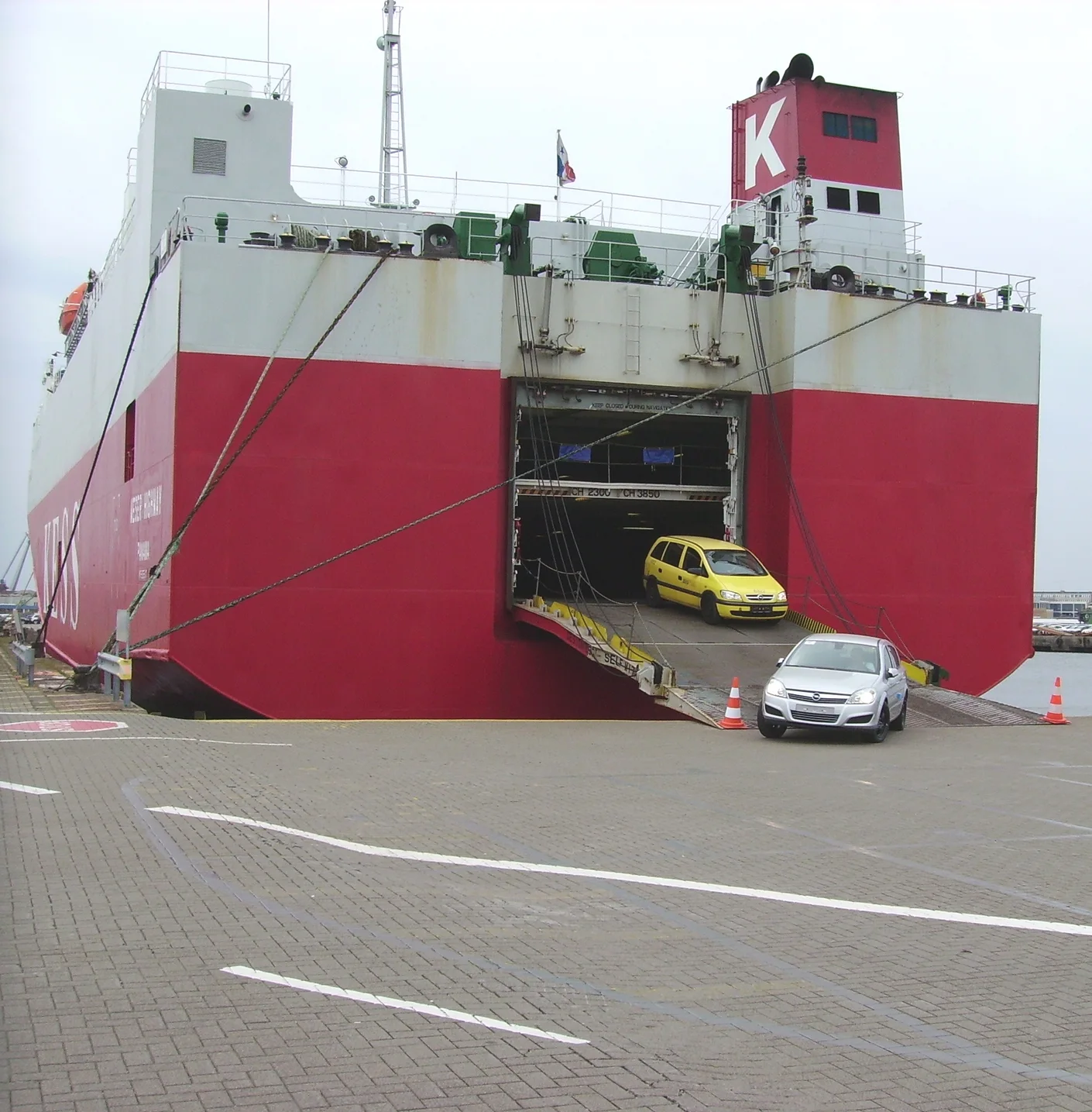 Industry photograph of vehicles discharging via the stern ramp of the RoRo vessel Weser Highway.
